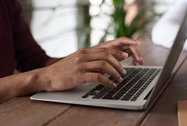 Products Person Using Macbook